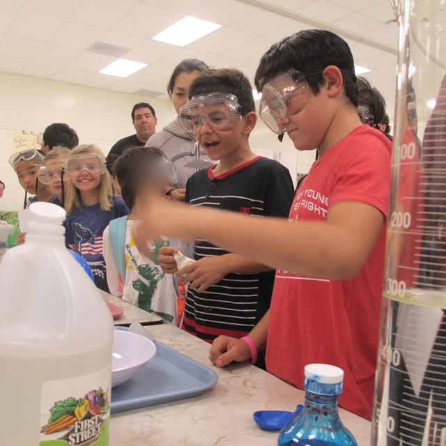 Students test out chemical reactions for the first time. They were very excited!